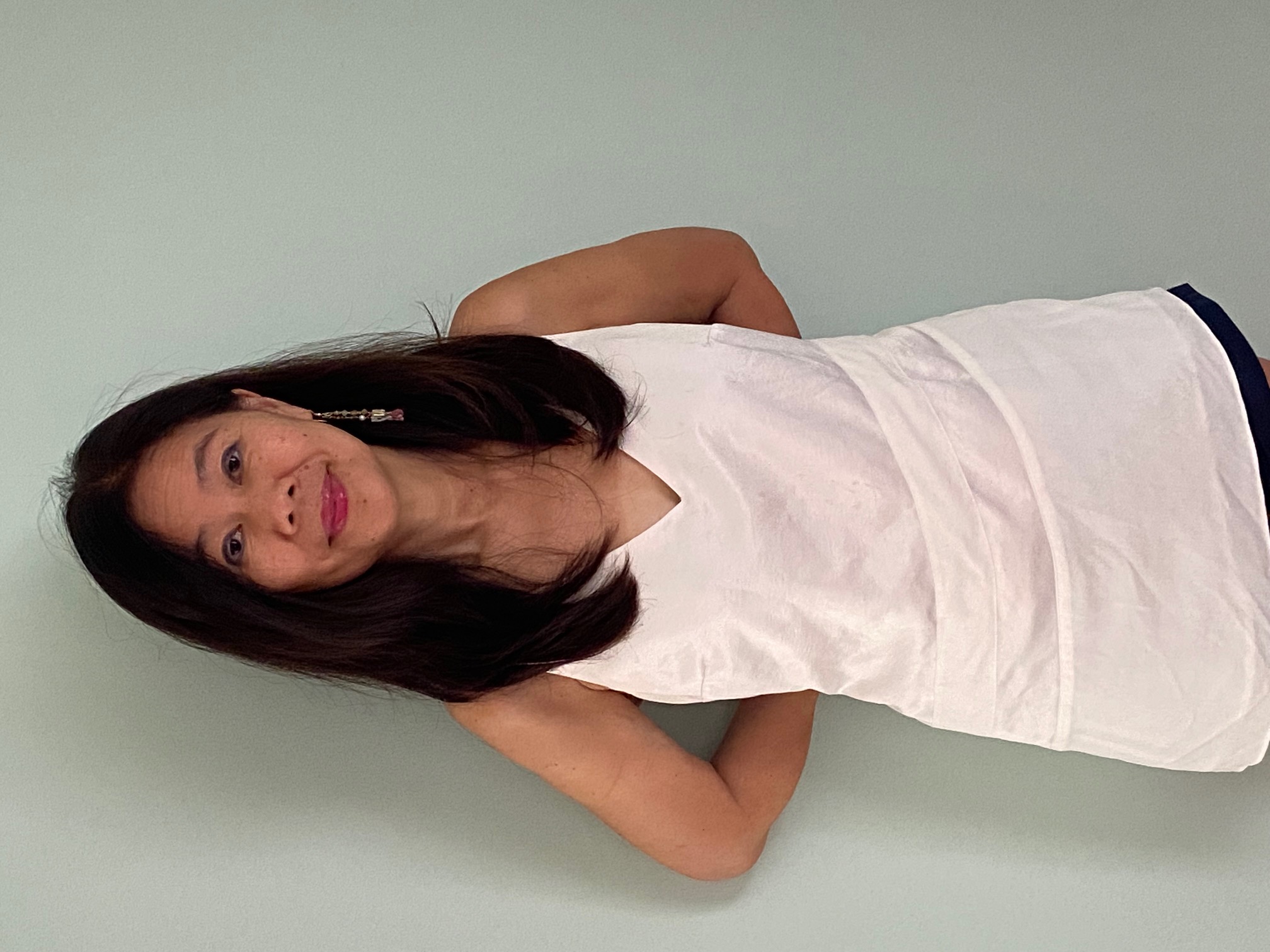 Joanne wearing a white top